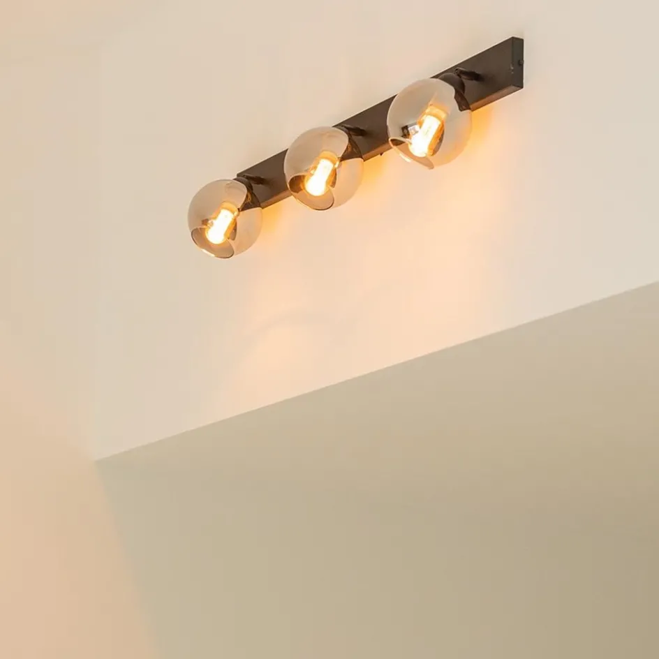 Langwerpige plafondlamp mat zwart met smoke glazen bollen>Straluma Online