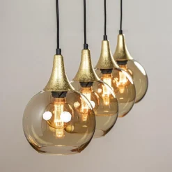 4-Lichts eettafelhanglamp zwart/goud met amber glazen bollen><noscript><img width=