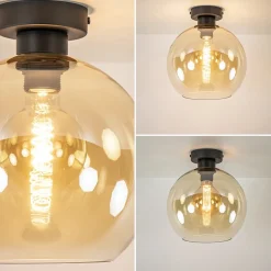 Mat zwarte plafondlamp met amber glazen bol><noscript><img width=