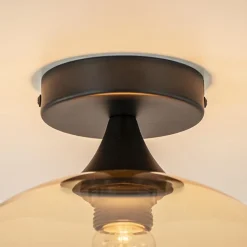 Mat zwarte plafondlamp met amber glazen bol 30 cm><noscript><img width=