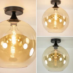 Mat zwarte plafondlamp met amber glazen bol 30 cm><noscript><img width=