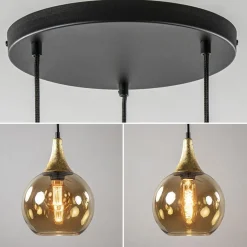 Ronde 3-lichts hanglamp zwart met goud en amber glas><noscript><img width=