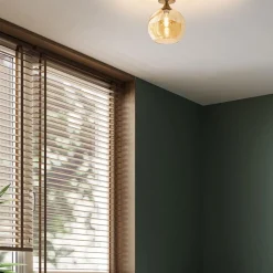 Ronde plafondlamp goud met amber glas><noscript><img width=